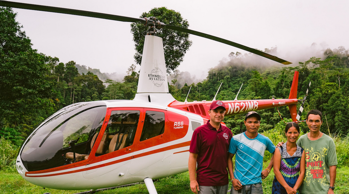 Robinson R-66, pilot and missionaries