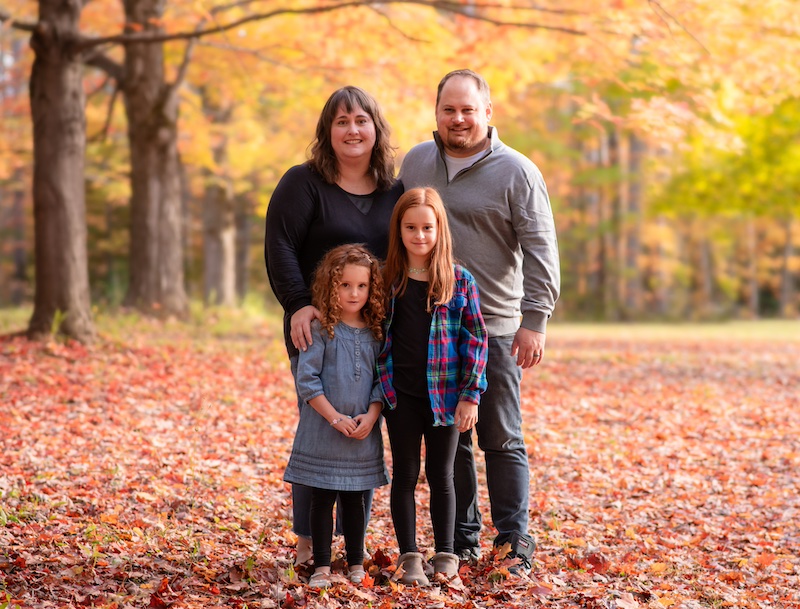 Pete and Carly Nichols with their children