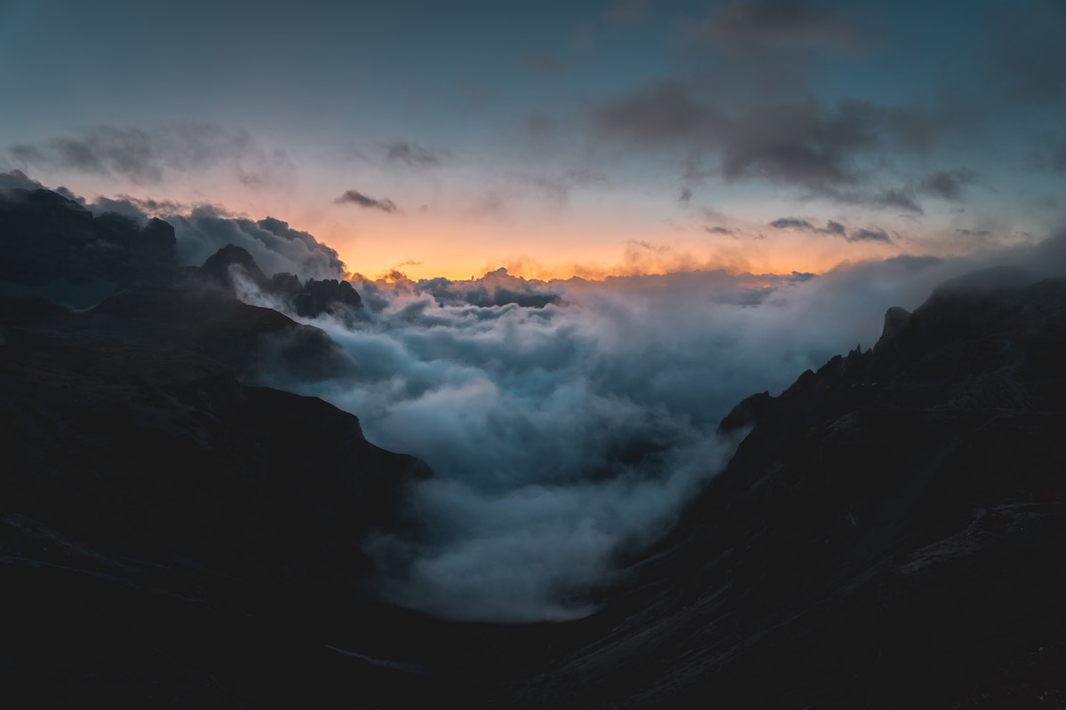a cloud choked valley in Italy